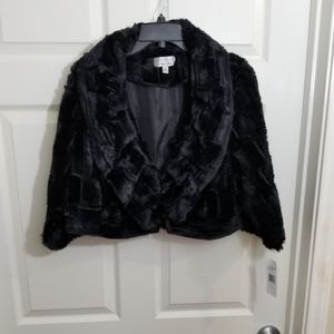 New!!! Black faux fur super soft shrug. Never worn! Smoke free home.